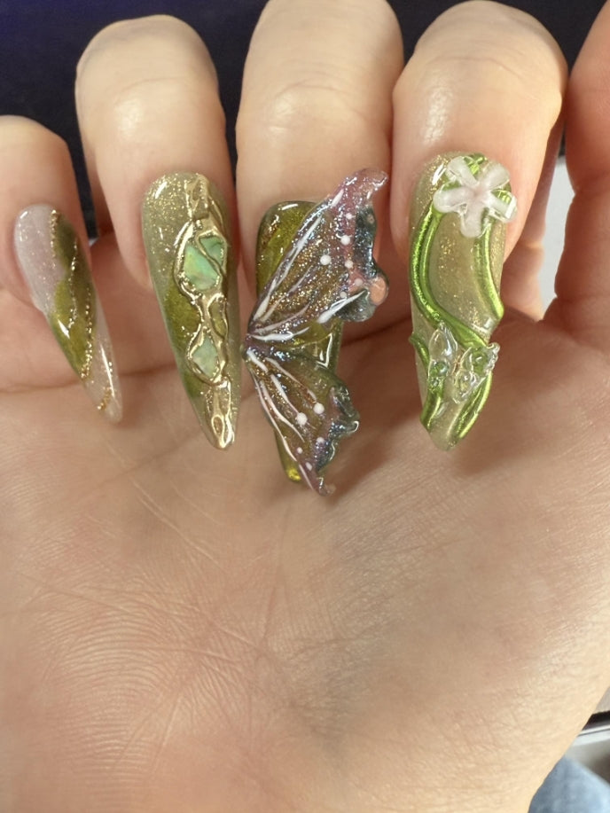 So gorgeous!! The butterfly wing design is incredible and pairs perfectly with my green dress!
