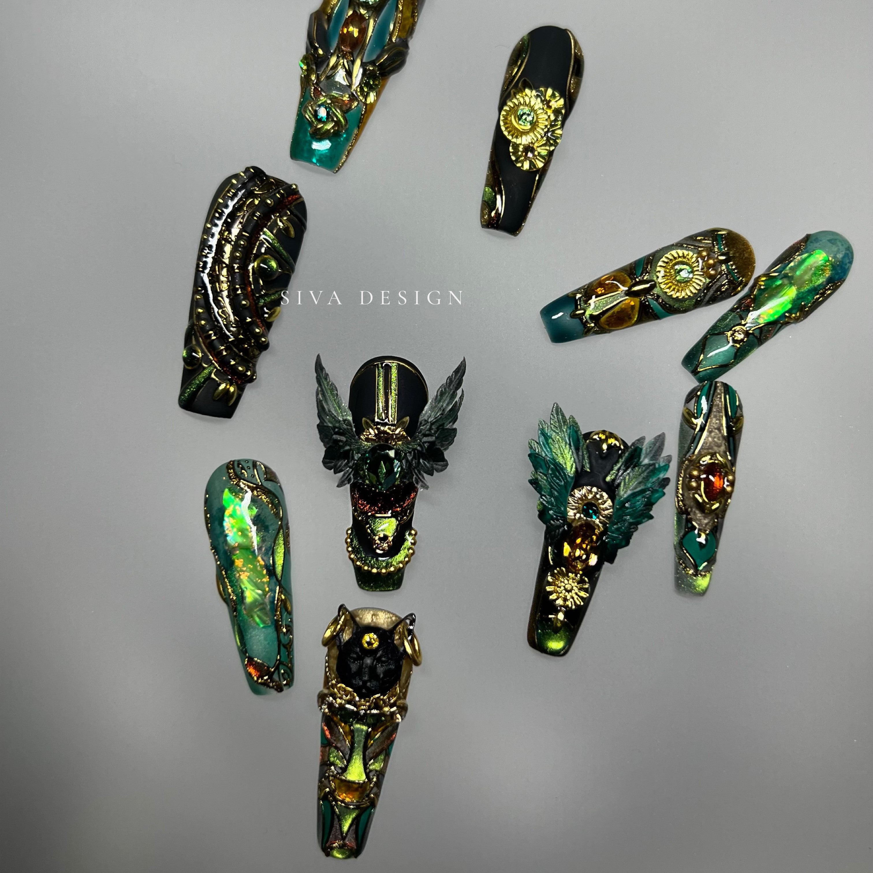 Emerald Green and Gold Nails
