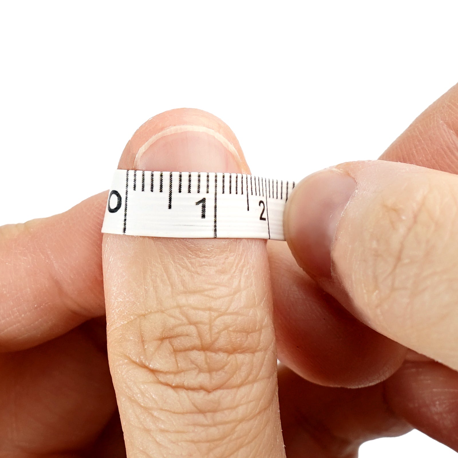 2 Place the measuring tape snugly along the curve of nail.